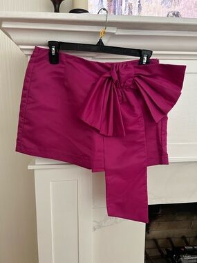 DELORETA from Anthropologie Fuchsia Mini Skort with Statement Bow.